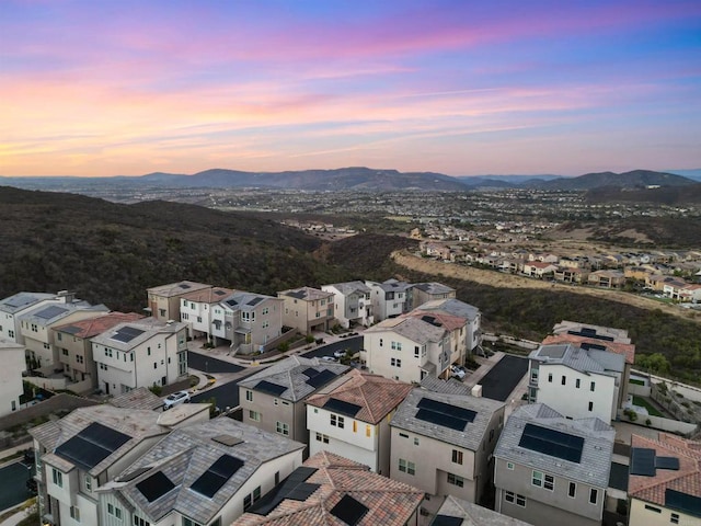 aerial view at dusk with a mountain view