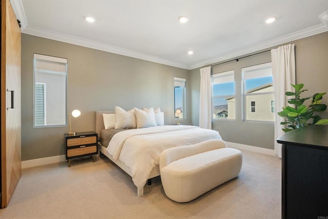 carpeted bedroom featuring crown molding