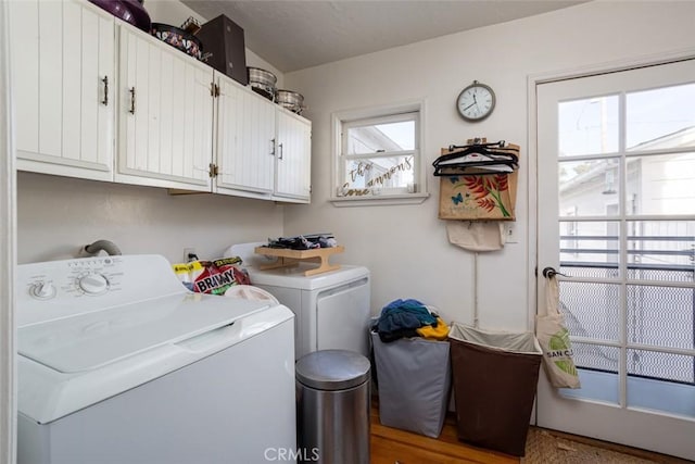 laundry area featuring cabinets and washer and dryer