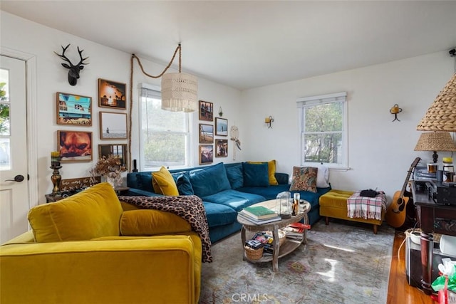 living room with an inviting chandelier