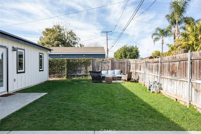 view of yard featuring an outdoor living space and a patio