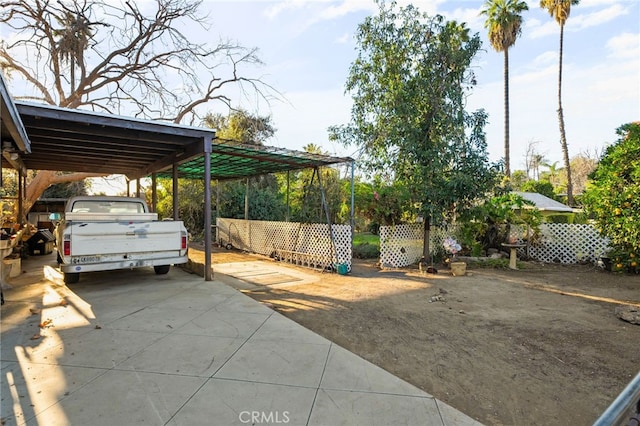 view of patio / terrace featuring a carport