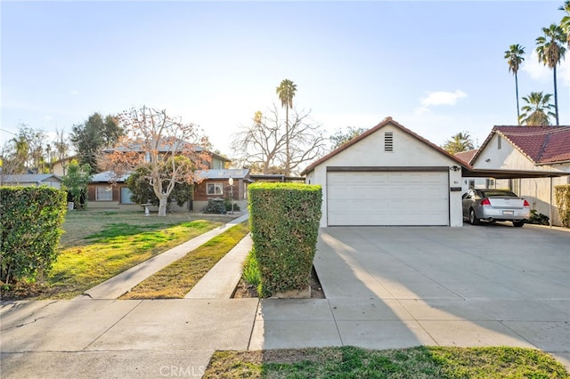 view of front facade with a front lawn and a garage