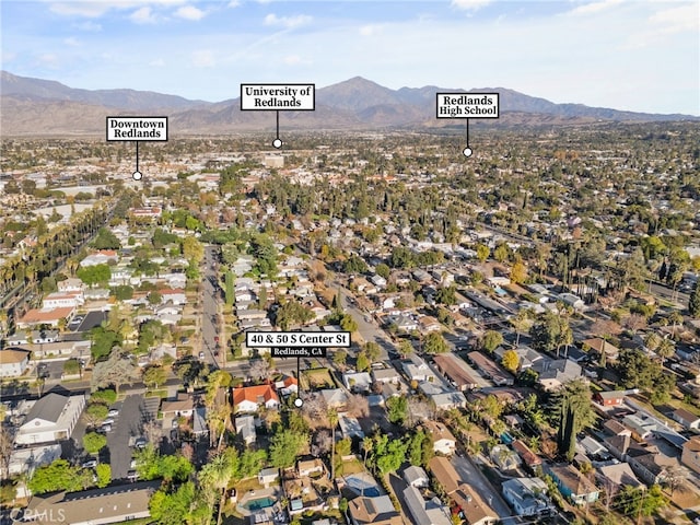 drone / aerial view featuring a mountain view