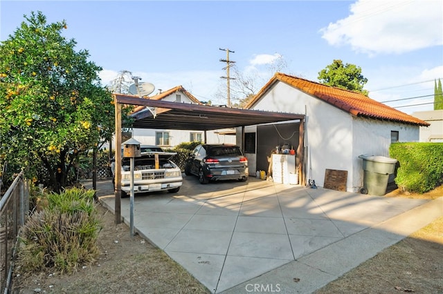 view of parking with a carport