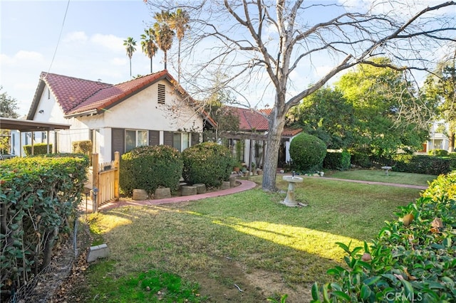 exterior space with a front yard