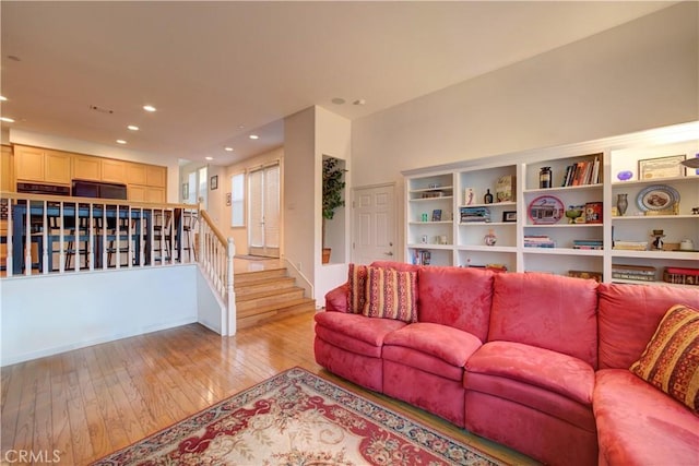 living room with light hardwood / wood-style floors