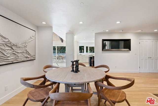 dining area featuring light hardwood / wood-style floors