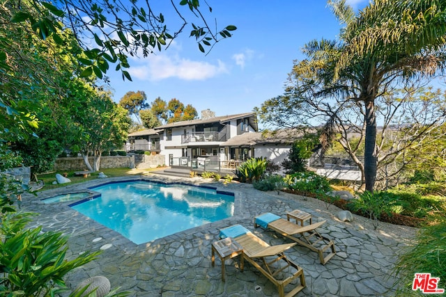 view of pool with a patio