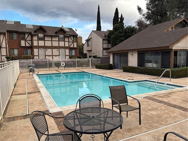 view of pool featuring a patio area