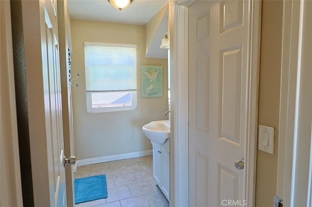 bathroom featuring sink and tile patterned floors