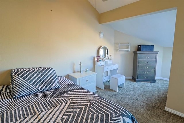 carpeted bedroom featuring vaulted ceiling with beams