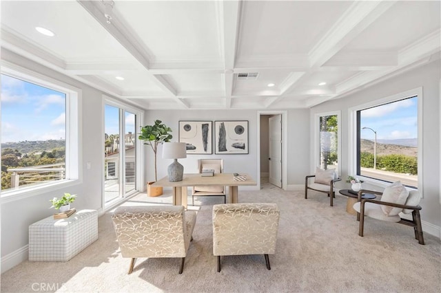 sunroom with a healthy amount of sunlight, beamed ceiling, and coffered ceiling