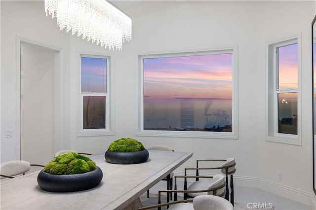 dining area with a notable chandelier