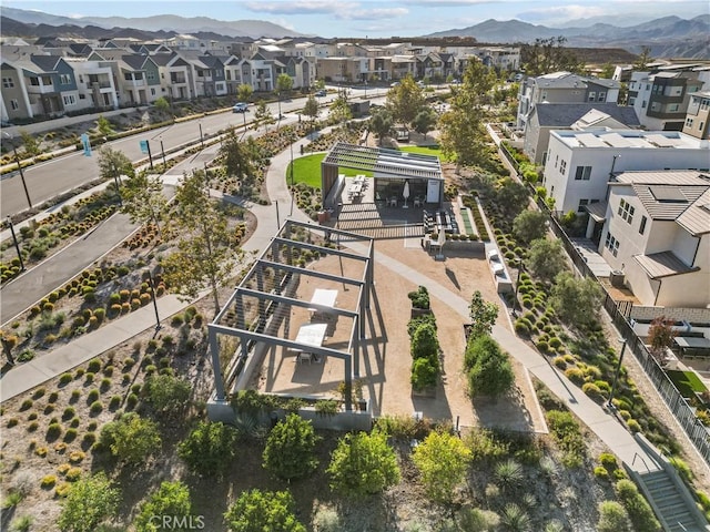 birds eye view of property featuring a mountain view