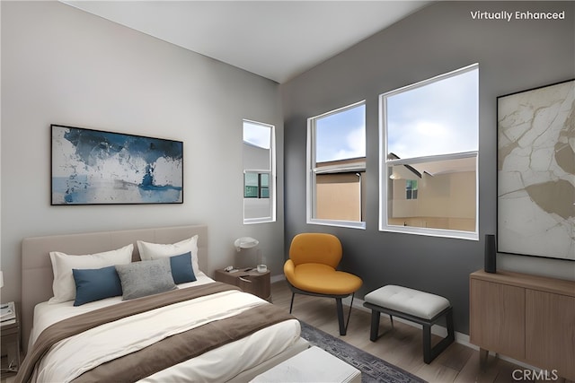 bedroom with wood-type flooring