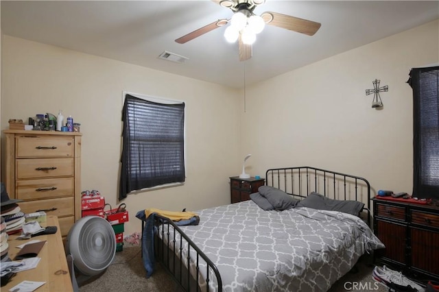 carpeted bedroom featuring ceiling fan