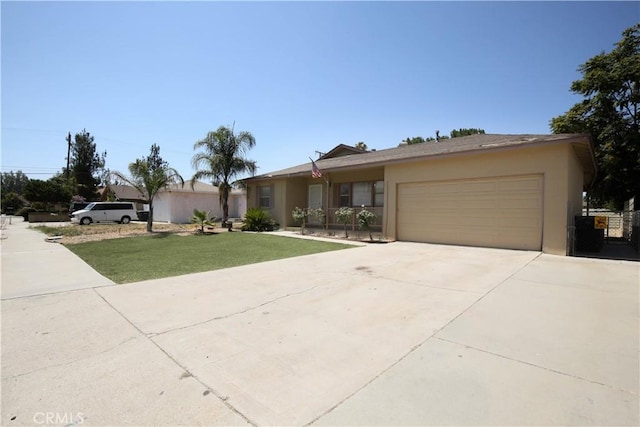 single story home with a garage and a front yard