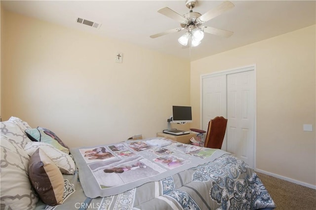 bedroom featuring ceiling fan, carpet flooring, and a closet