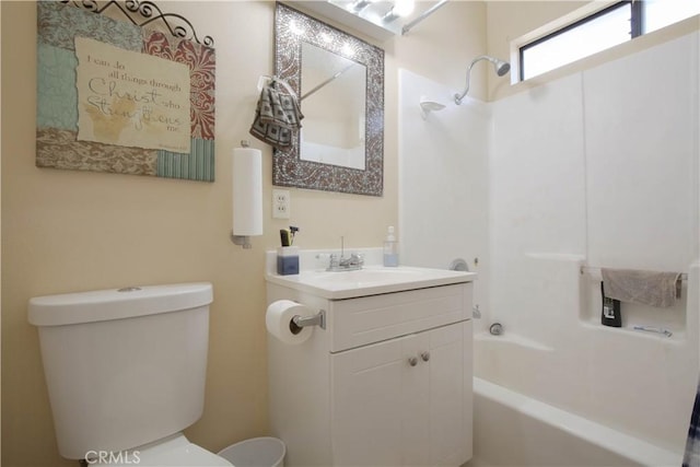 bathroom featuring toilet and vanity