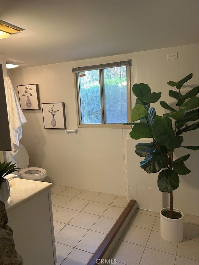 bathroom featuring vanity and tile patterned flooring