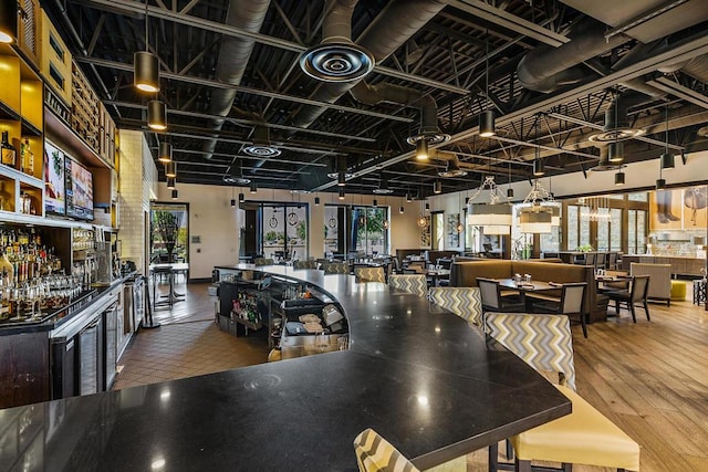 interior space with hardwood / wood-style flooring and a healthy amount of sunlight