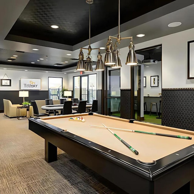 game room with carpet, a tray ceiling, and billiards