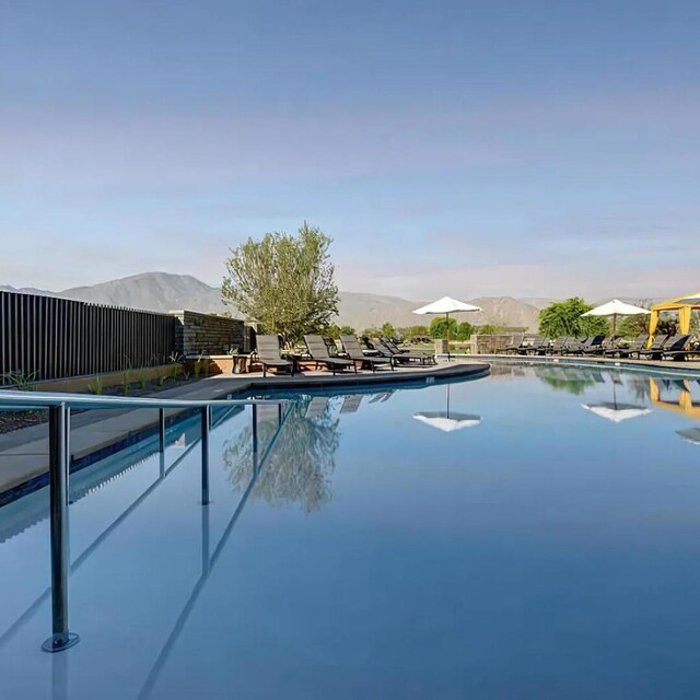 view of pool with a mountain view