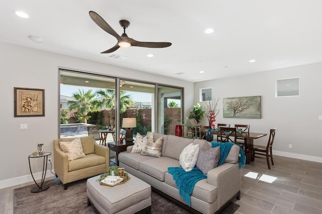 living room featuring ceiling fan