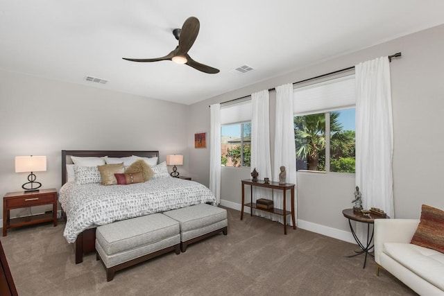 carpeted bedroom with ceiling fan