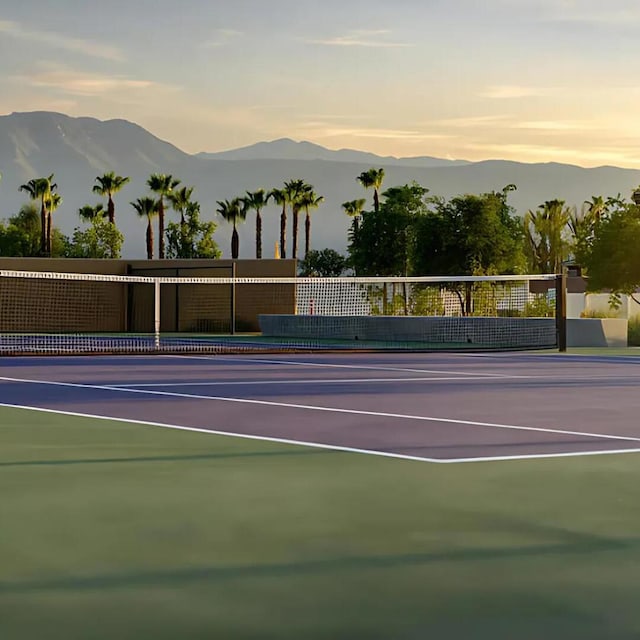 view of sport court with a mountain view