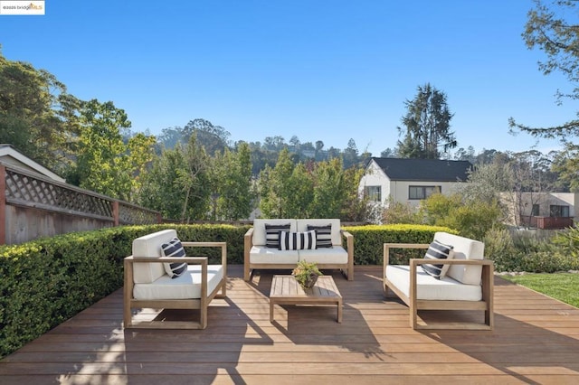 deck featuring an outdoor living space