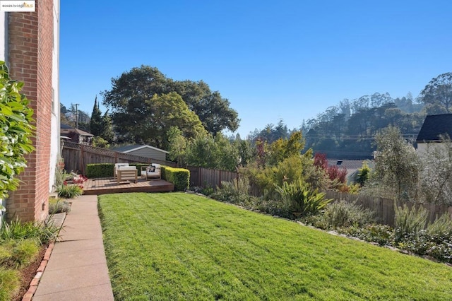 view of yard featuring a deck