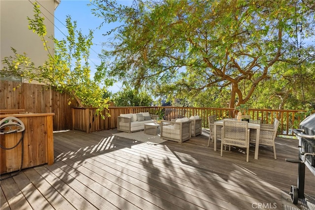 wooden deck featuring an outdoor hangout area