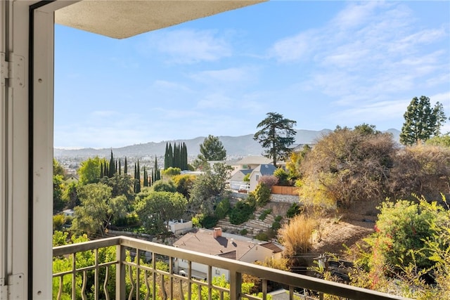 balcony featuring a mountain view