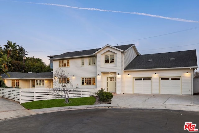 view of front of home with a garage