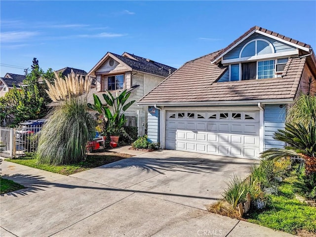 front of property with a garage