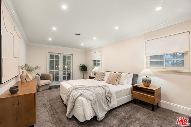 carpeted bedroom with crown molding