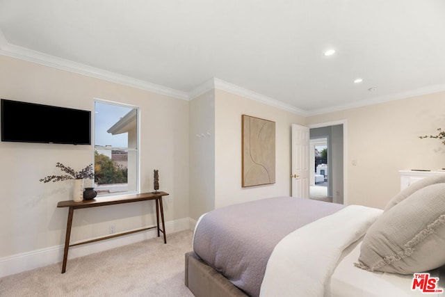 carpeted bedroom featuring ornamental molding