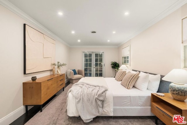 bedroom with crown molding