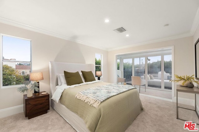 carpeted bedroom with ornamental molding and multiple windows