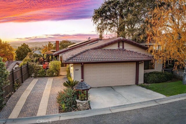 view of front of property with a garage