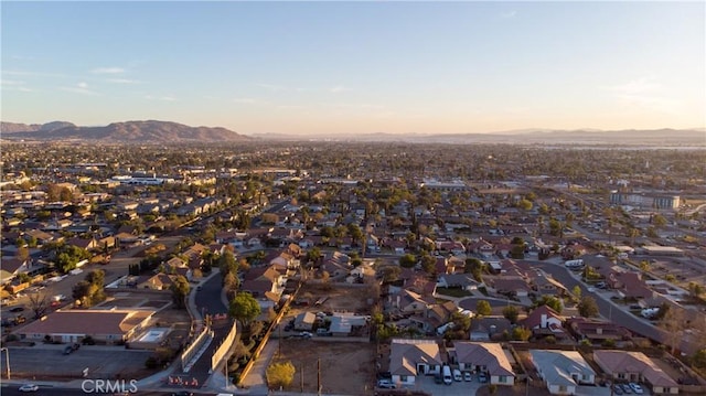 aerial view at dusk with a mountain view