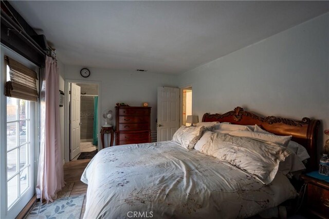 bedroom with connected bathroom