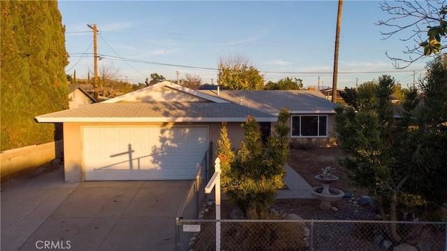 ranch-style home with a garage