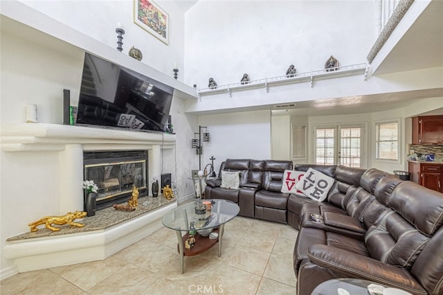 living room featuring light tile patterned floors