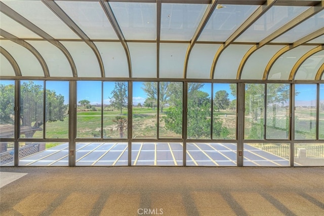 unfurnished sunroom with a healthy amount of sunlight