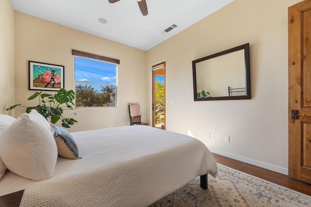 bedroom featuring ceiling fan and hardwood / wood-style floors