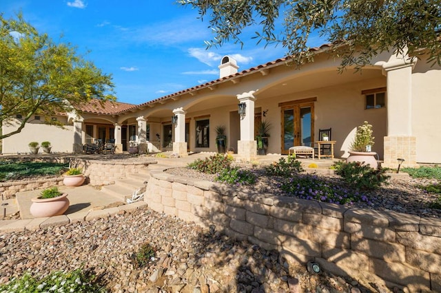 rear view of house with french doors