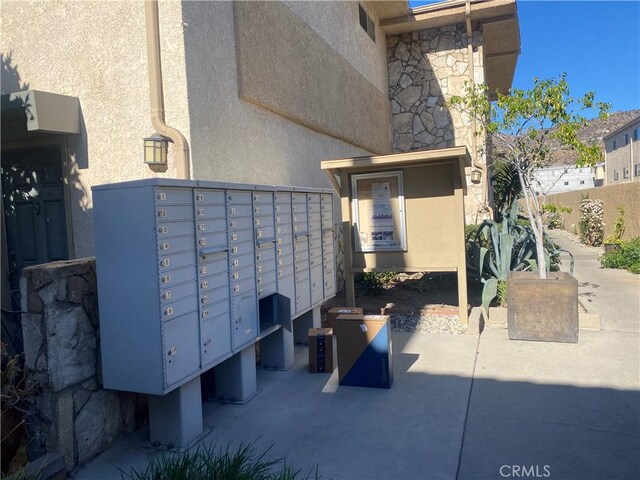 view of community with mail boxes